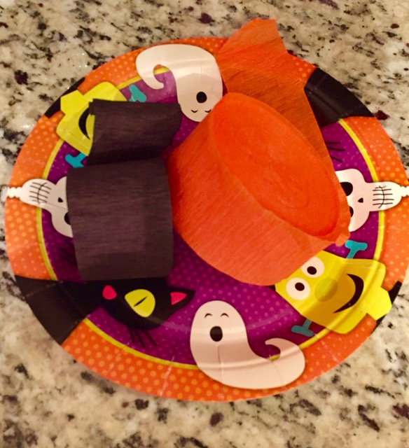 paper plate with paper mache for Halloween pinata