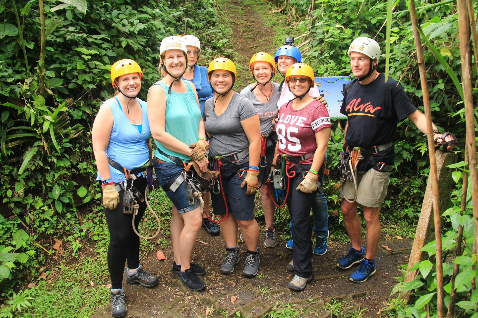 a group of people practicing ziplining