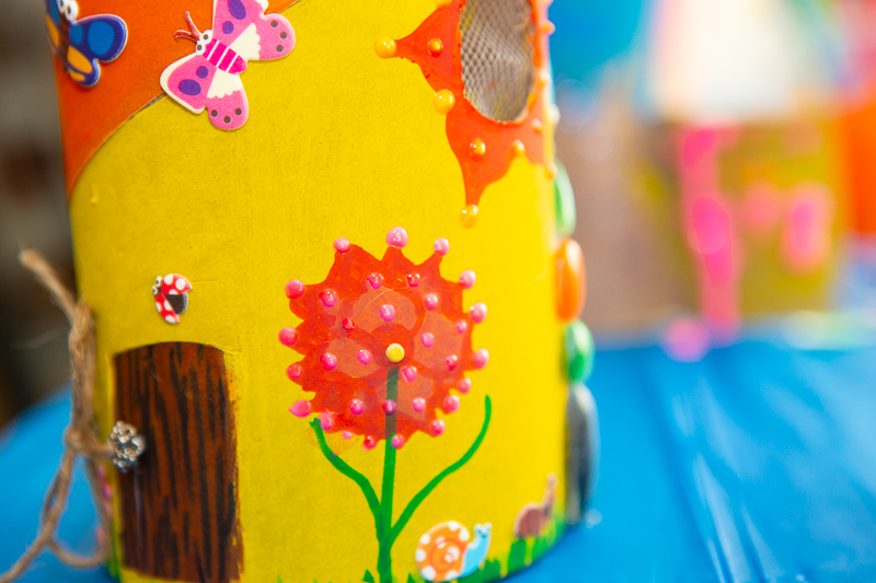 flower painted on bug hotel