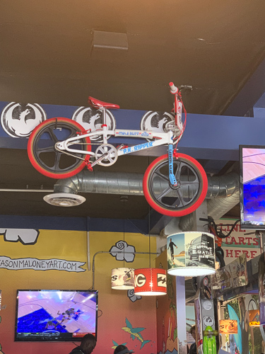 A bicycle hanging in the Fish Taco restaurant in California.