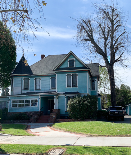 A blue house in Orange Town in California.