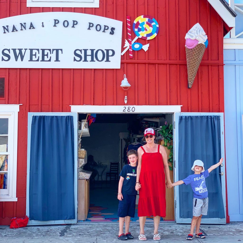 two boys with her mom at Nana and Pops Pop's Sweet Shop