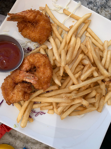 shrimp with fries, ketchup and sauce
