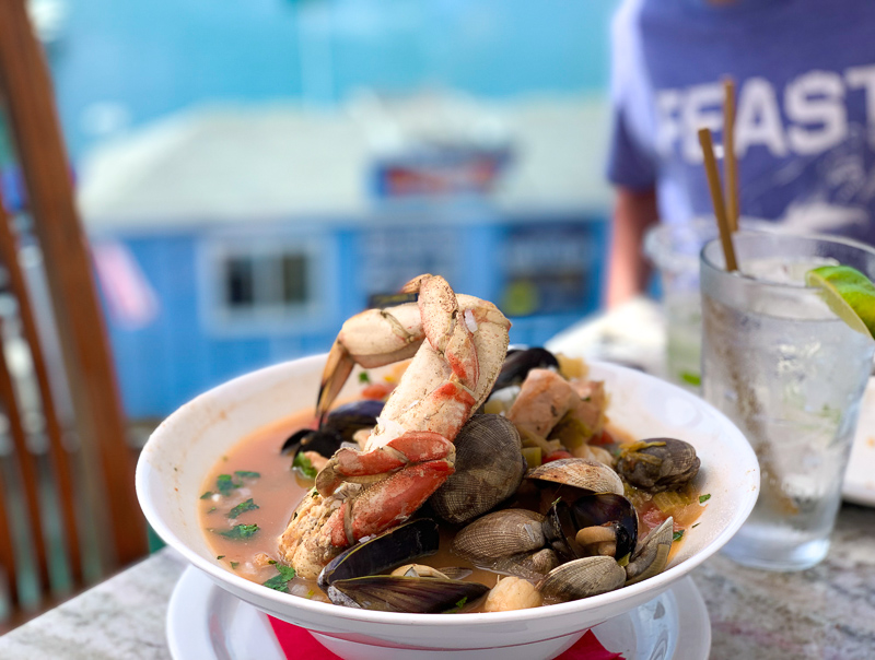 best Siete Mares seafood dish to try at oceanside California, it is full of shrimp, clams, scallops, mussels, and crab legs.