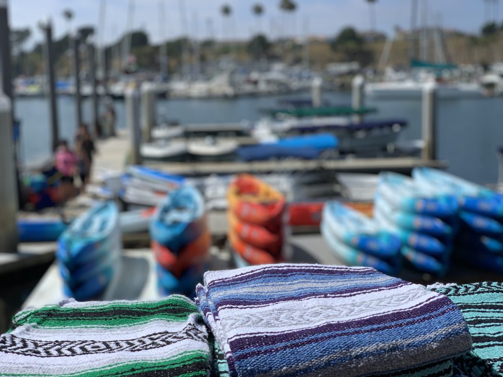 blankets to use during a boat ride around the harbor