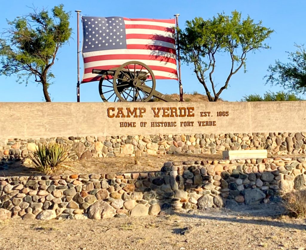 Camp Verde sign with American Fl