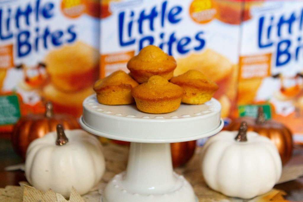 pumpkin little bites on a white mini stand with white pumpkin decor.